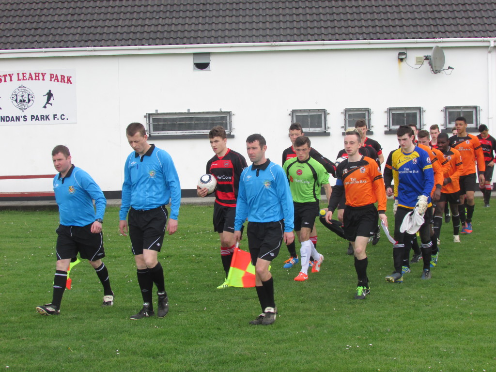 The teams entering the pitch before todays National Cup Semi Final 
