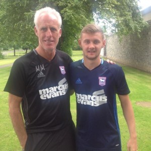 Ipswich Town Fc Manager Mick McCarthy with Shane McLoughlin last week in Dublin as part of their Pre Season training tour .